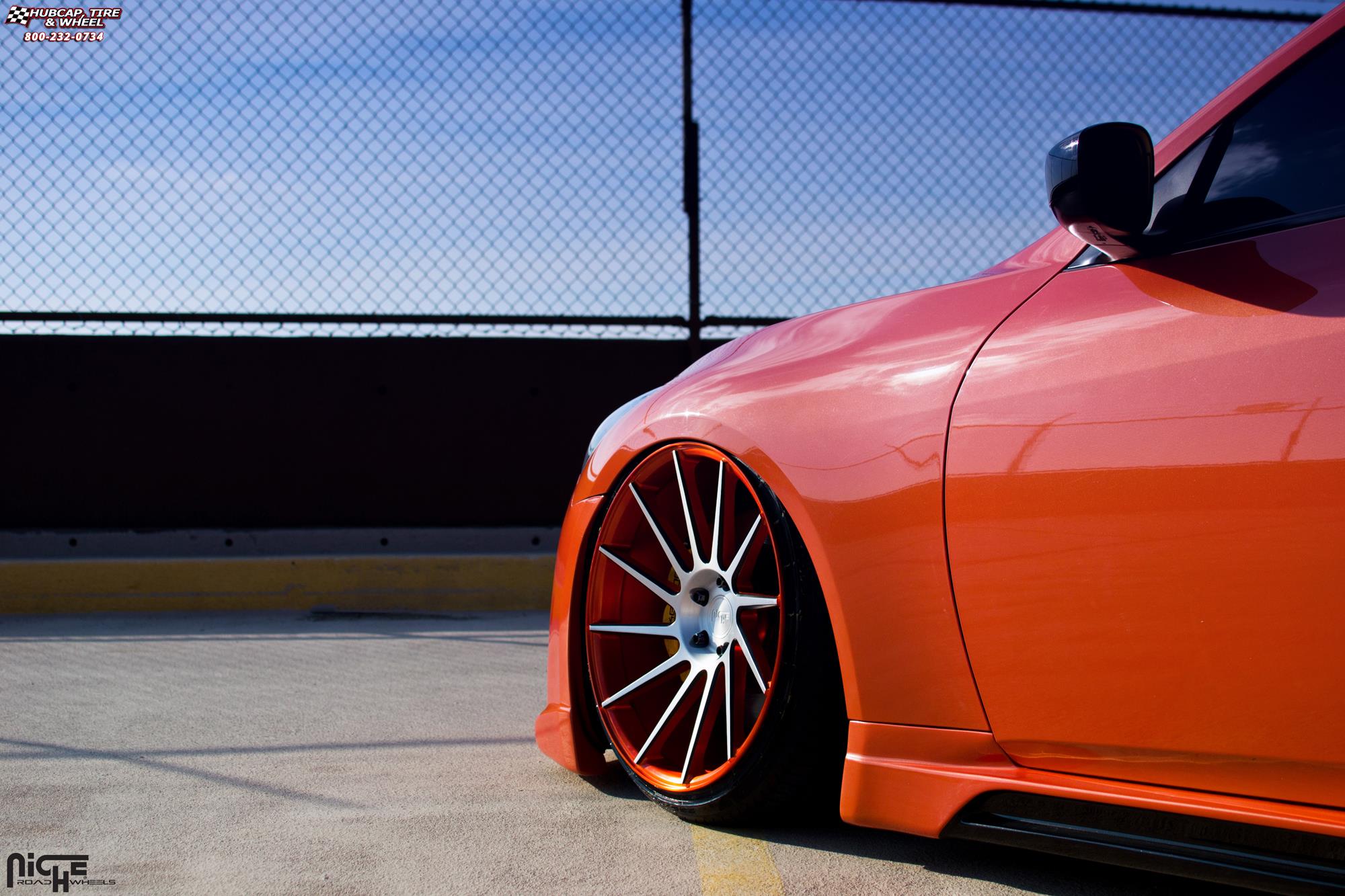 vehicle gallery/infiniti g37s niche surge 20x105  Brushed, Infiniti Orange, black accents wheels and rims