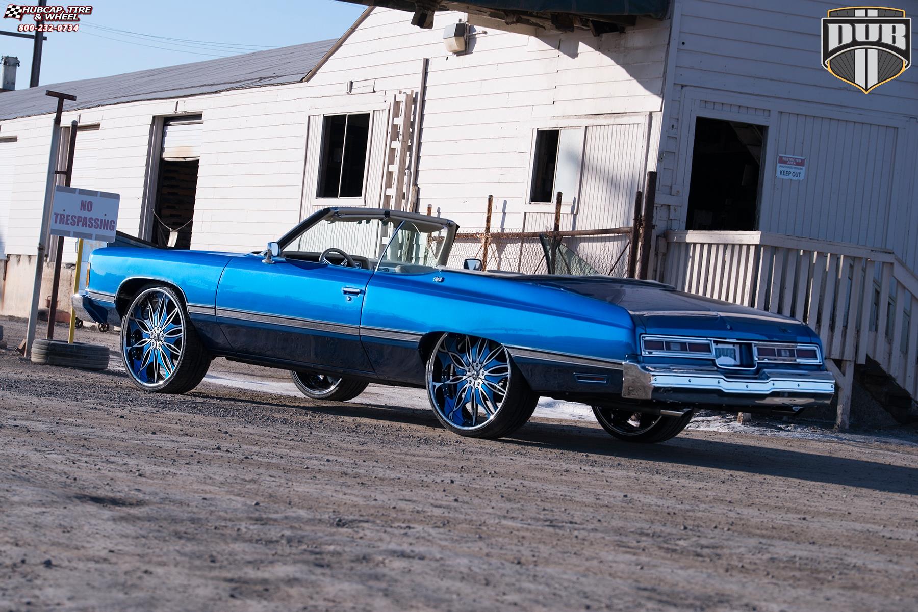 vehicle gallery/chevrolet caprice dub x89 trip 26X9  Brushed w/ black & blue accents, chrome lip wheels and rims