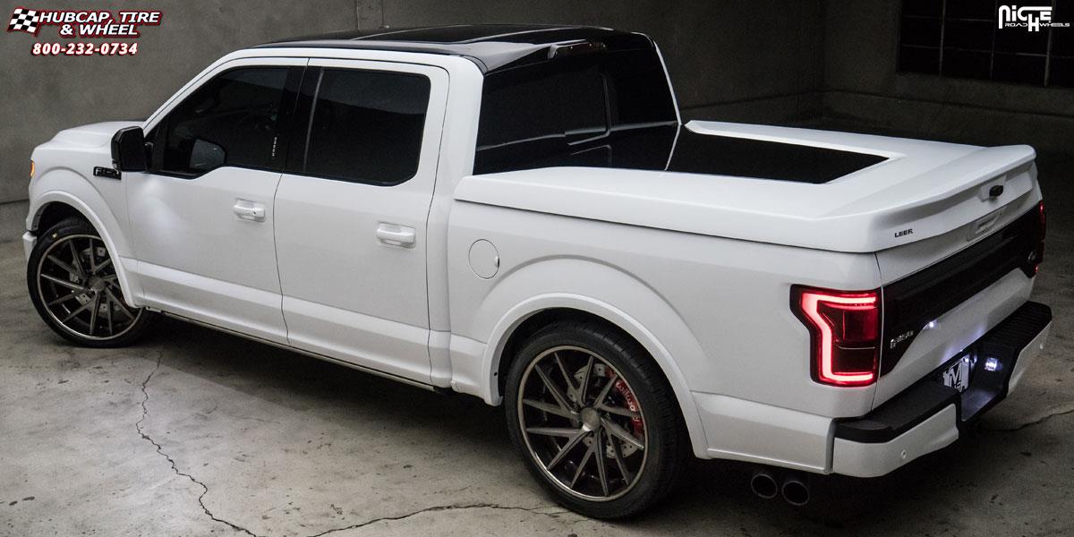 vehicle gallery/ford f 150 niche invert 2.00x10  Matte Black Center, Gloss black outer w red stripe wheels and rims